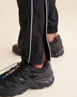 Outdoor Athletics Nylon Track Pant 20 Outdoor Athletics Nylon Track Pant -Unde Clothing Shop https3A2F2Fwww.roots .com2Fdw2Fimage2Fv22FBGGS PRD2Fon2Fdemandware.static2F 2FSites roots master catalog2Fdefault2Fdwd559e3fe2Fimages2F39110068 001 g.jpg3Fsw3D120026sh3D120026sm3Dfit 640x